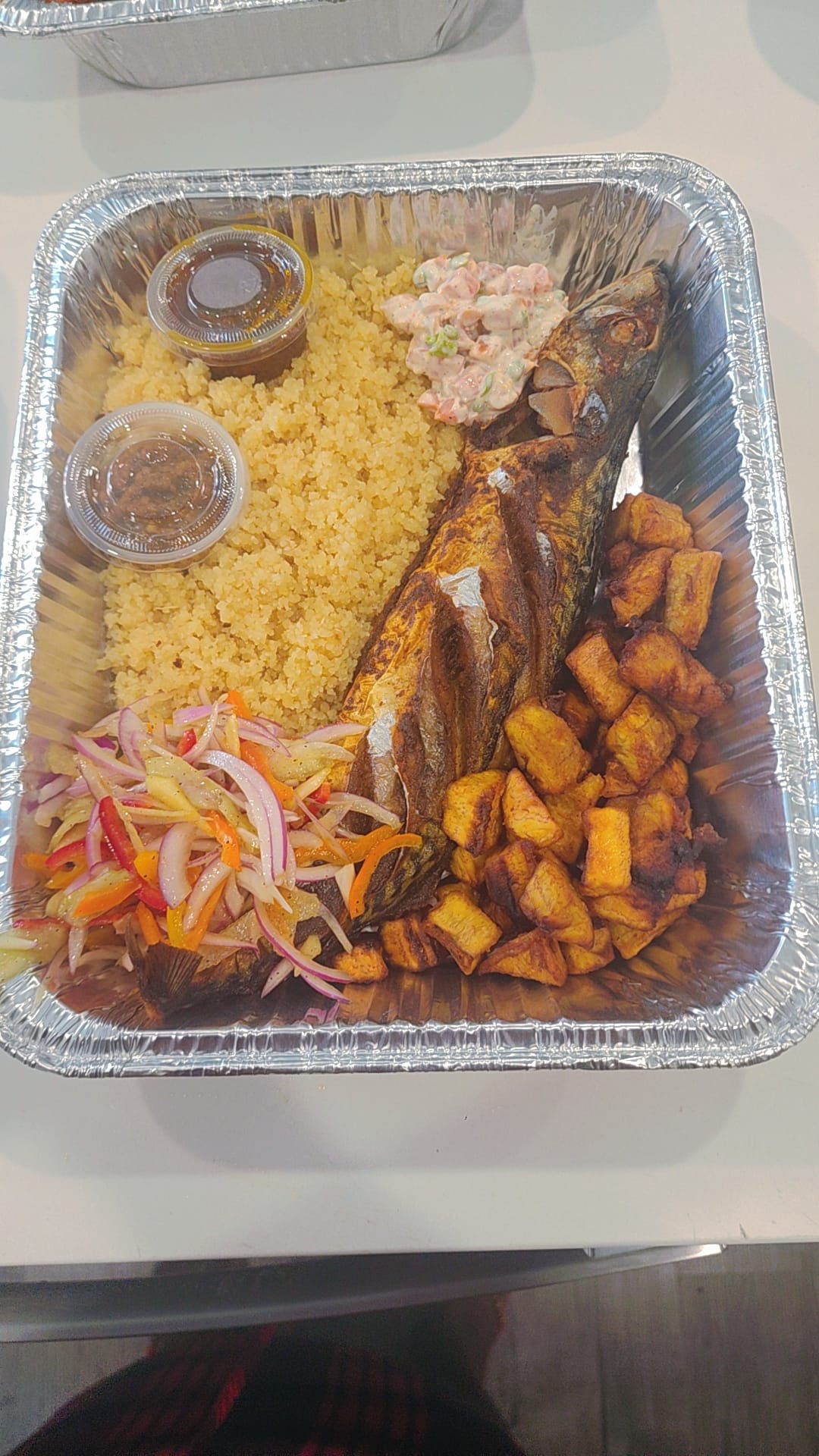Attieke platter with fish and plantains